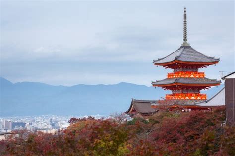 Premium Photo | Kyoto city and red pagoda of Kiyomizu-dera Temple in autumn