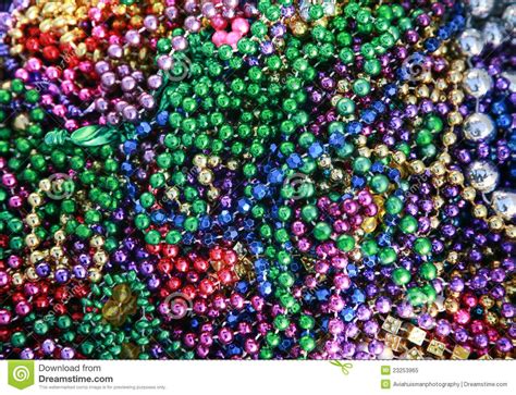 colorful beads are stacked together on top of each other in this close ...