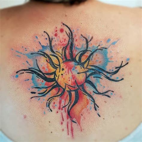 Colorful Realistic Sun Tattoo On Upper Back For Women | Rainbow tattoos, Foot tattoos, Sun tattoos