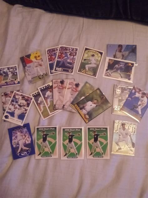 My collection of Derek Jeter baseball cards. I have about 200 cards of ...