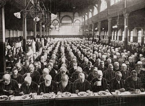 Dinnertime for the inmates of a workhouse, London, England in the late 19th century. Workhouses ...