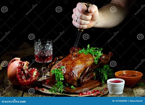 Roast Duck with Cranberry Sauce and Pomegranate Stock Photo - Image of ...