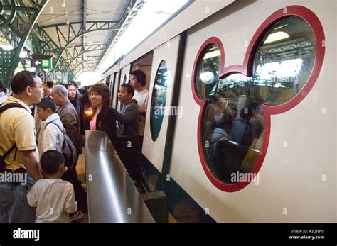 Disneyland Hong Kong SAR China. Tourists arriving on special train at ...