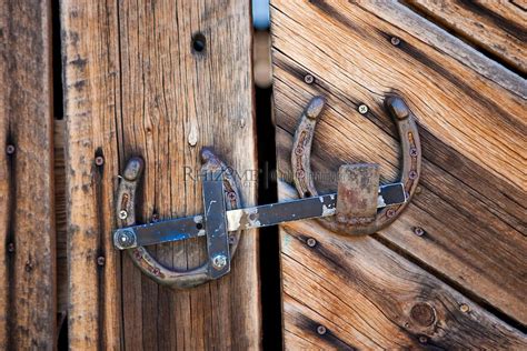 Western barn door with homemade latch made out from old horseshoes. | Horse barn doors ...