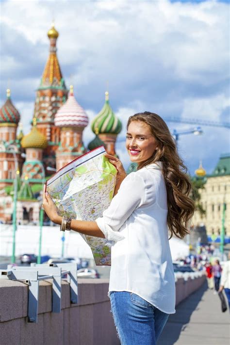 Young Beautiful Girl Holding a Tourist Map of Moscow Stock Photo ...