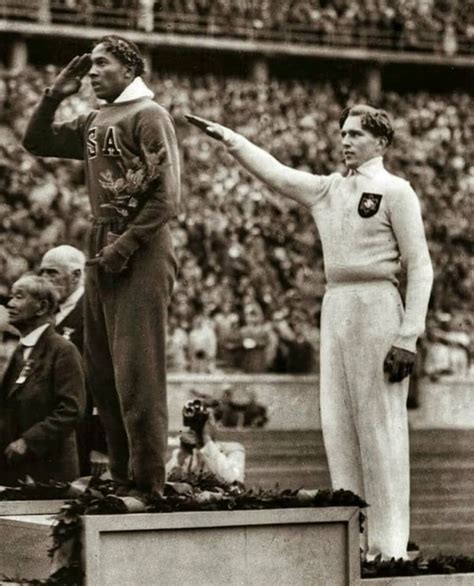 Jesse Owens winning the gold at the 1936 Olympics. | 1936 olympics, Jesse owens, Sports hero