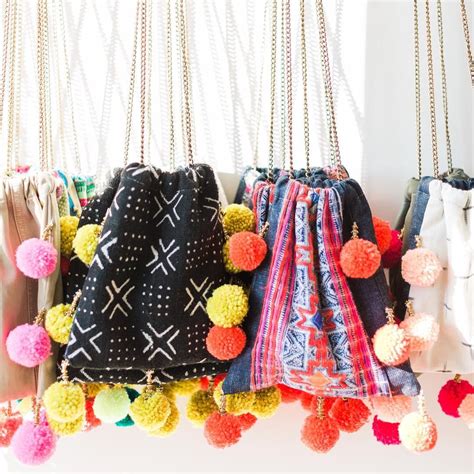 We love these vibrant pom pom bags, perfect for the beach, brunch, and ...