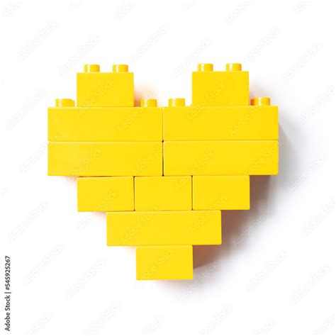 Yellow heart from Lego blocks isolated on white background, top view ...