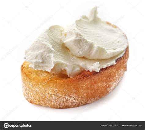 Toasted bread with cream cheese Stock Photo by ©magone 168155210