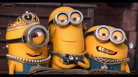 three minions from the movie despicables are standing next to an open book