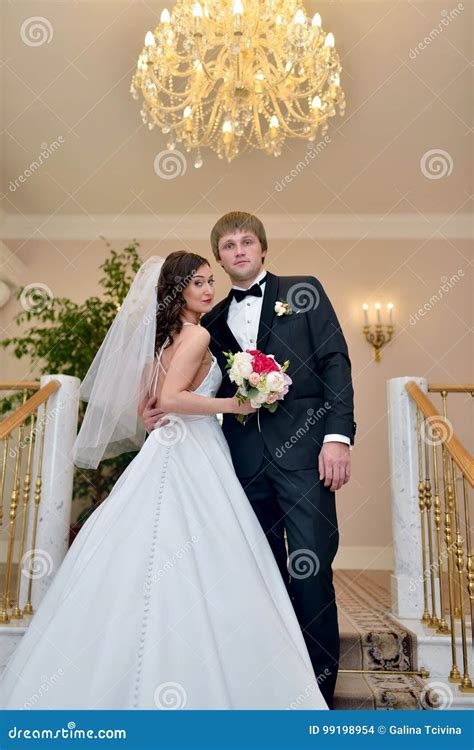 Wedding Couple Indoors is Hugging Each Other Stock Photo - Image of black, couple: 99198954