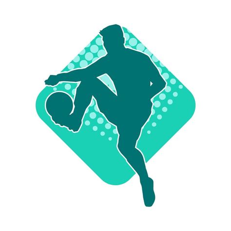 Silhouette of a male soccer player kicking a ball. Silhouette of a football player in action ...