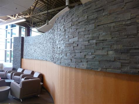 How to installed stacked stone panels on curved walls