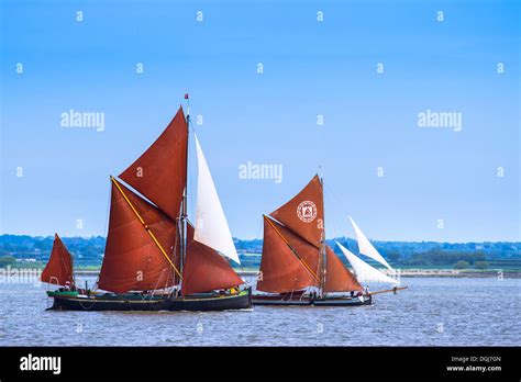 Two historic Thames sailing barges racing on the river Blackwater Stock ...