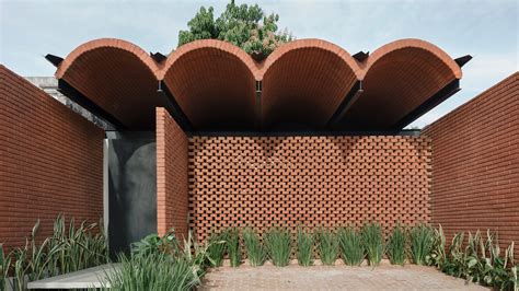 Vaulted Brick Roof Spans Intermediate House By Equipo De Arquitectura