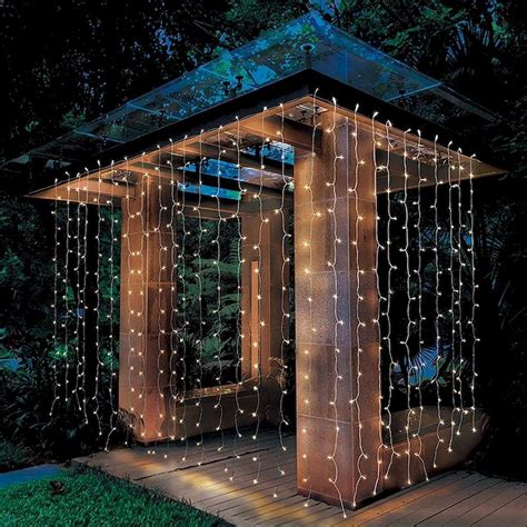 beautiful idea for back porch | Led curtain lights, Better homes and gardens, Backyard