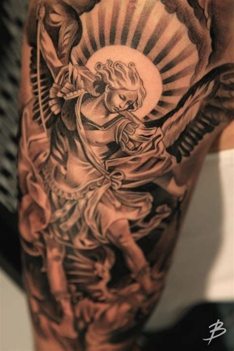 8 Powerful & Protective Archangel Michael Tattoos | Archangel michael tattoo, St michael tattoo ...