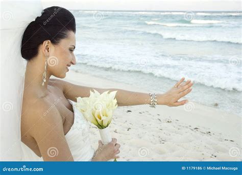 Caribbean Beach Wedding - Bride with Bouquet Stock Photo - Image of wedding, sand: 1179186