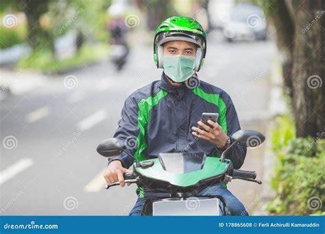 Motorcycle Taxi Driver Taking Order Via Mobile Phone Online App Stock Photo - Image of asian ...