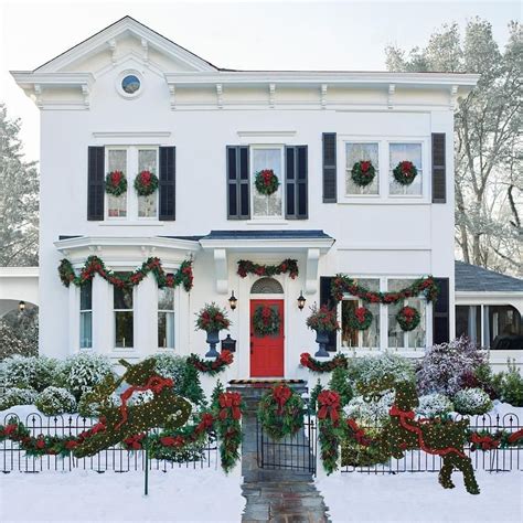 White Christmas House Decor with Wreaths and Green Garlands # ...