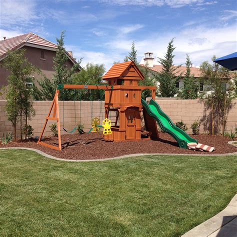 Landscaping Underneath Swing Sets | McCabe's Landscape Construction