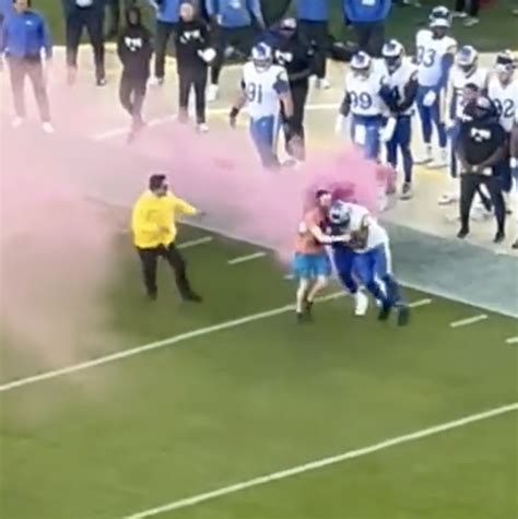 Bobby Wagner Takes Out Pink Smoke Bomb Fan