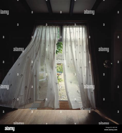 Curtains in the wind hi-res stock photography and images - Alamy