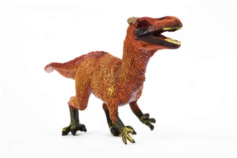 Dinosaur rubber toy isolated on white 2487112 Stock Photo at Vecteezy