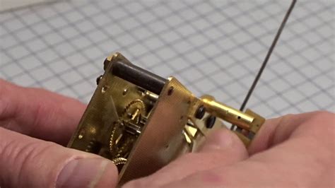 How to replace a suspension spring on a mechanical clock - YouTube