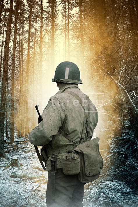 Picturebox | A second world war American soldier in a forest at dawn. WW2.