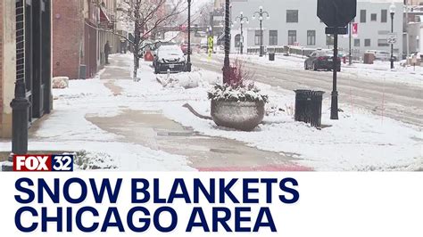 Snow blankets Chicago area, the latest totals - YouTube