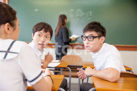 Students Talking In The Classroom Stock Photo | Royalty-Free | FreeImages