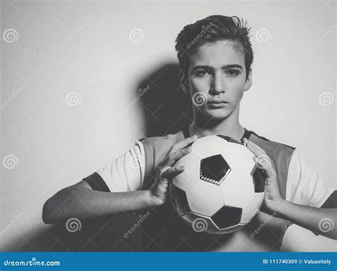 Photo of Teen Boy in Sportswear Holding Soccer Ball Stock Image - Image of background ...