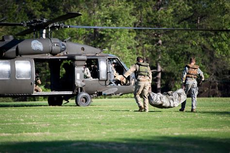 U.S. Army Rangers load a UH-60 Black Hawk helicopter - NARA & DVIDS Public Domain Archive Public ...