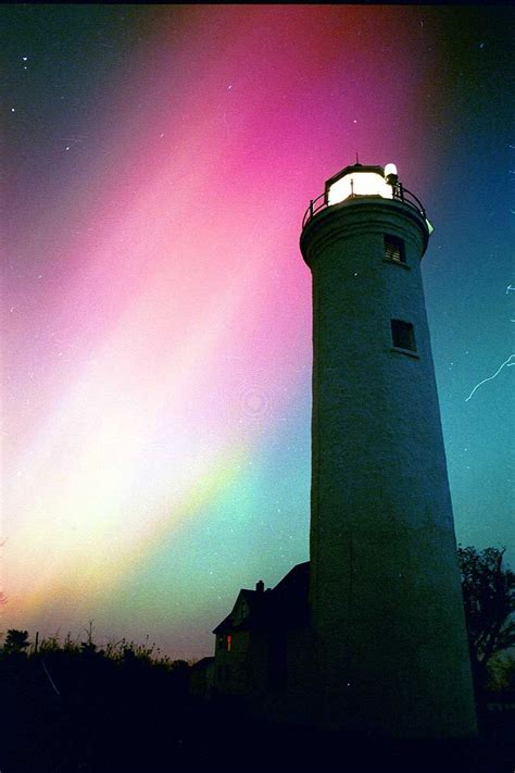 The northern lights (Aurora Borealis) over Tibbets Point Lighthouse a few miles west of the ...