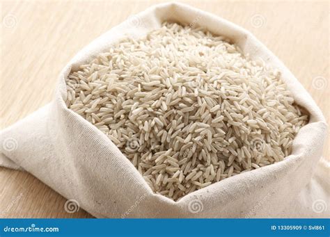 Brown rice in bag stock image. Image of store, kernel - 13305909