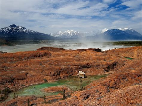 Hot springs between brown rocks HD wallpaper | Wallpaper Flare