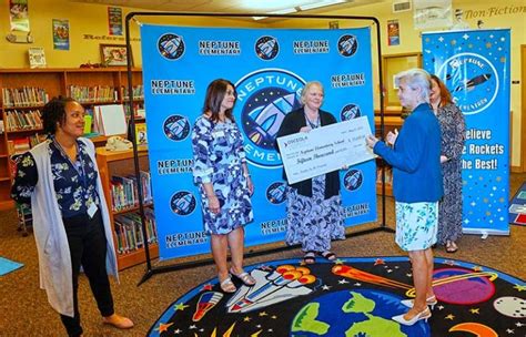 Commissioner Cheryl Grieb presents $15,000 check to Neptune Elementary to support "Leader in Me ...