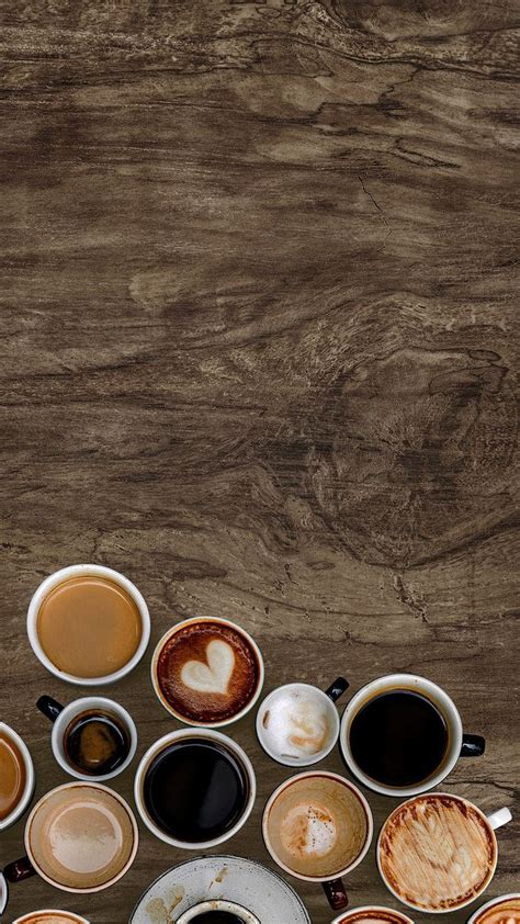 Assorted coffee cups on a natural wooden textured background | free ...