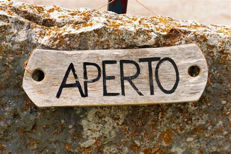 Aperto - Open Sign in Italian Language Stock Image - Image of string ...