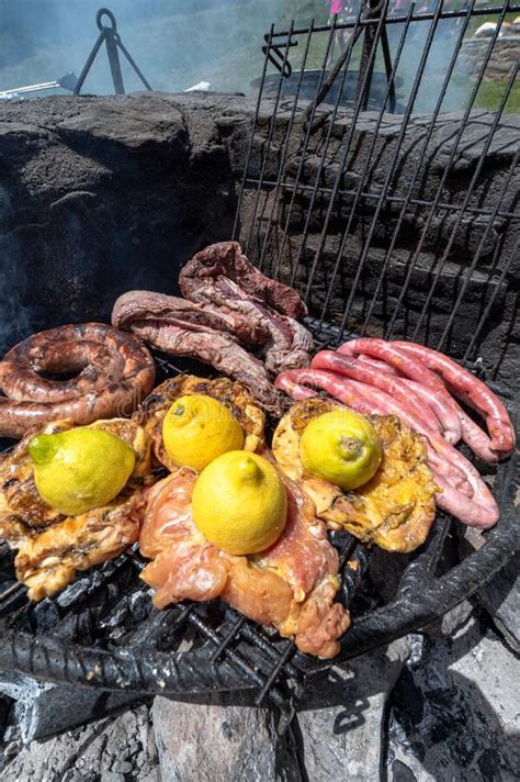 Typical Uruguayan and Argentine Asado Cooked on Fire. Entrana and Vacio ...