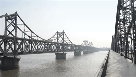 yalu river bridge morning distance north Stock Footage Video (100% ...