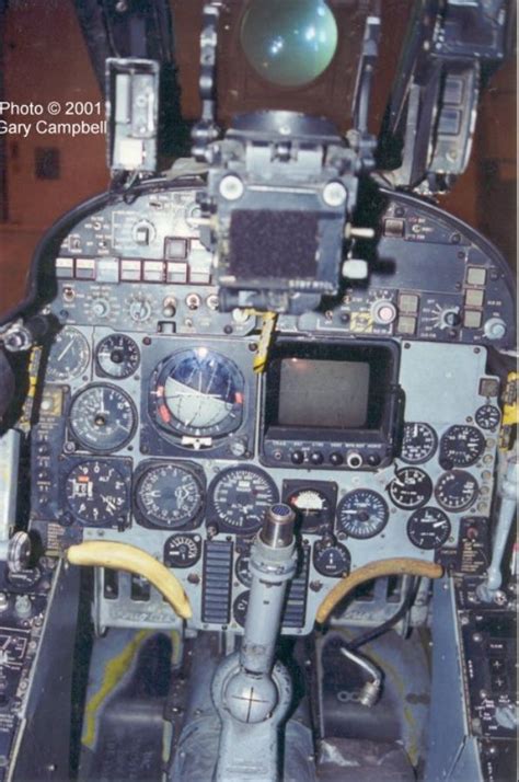 the cockpit of an airplane with many instruments