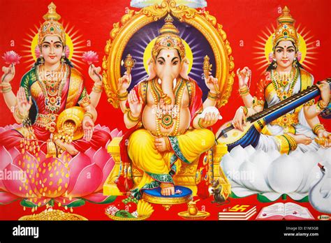 Hindu godess Laxmi, god Ganesh & goddess Saraswati (left to right Stock Photo: 69897979 - Alamy