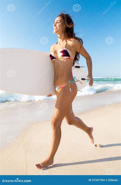 Surfer girl at the beach stock image. Image of smile - 37347763