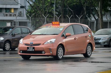 Prime Taxi Toyota Prius Alpha Hybrid Taxi | nighteye | Flickr