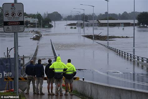 'Flood proof' bridge in Sydney's west completely submerged by flood waters | Daily Mail Online