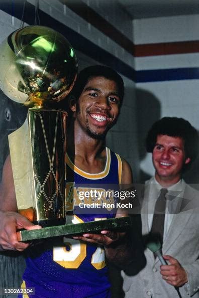 Magic Johnson of the Los Angeles Lakers celebrates with the trophy ...