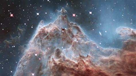 Celestial Snow Angel: Star-forming Region Sharpless 2-106 | HubbleSite