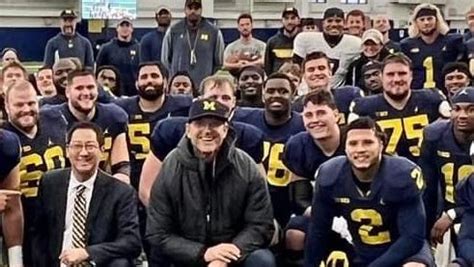 Santa Ono posts Michigan team photo that includes Connor Stalions